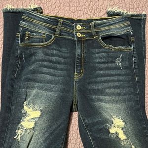 Distressed skinny jeans.